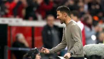 Soccer Football - DFB Cup - Quarter Final - Bayer Leverkusen v VfB Stuttgart - BayArena, Leverkusen, Germany - February 6, 2024 Bayer Leverkusen coach Xabi Alonso celebrates after Jonathan Tah scores their third goal REUTERS/Thilo Schmuelgen DFB REGULATIONS PROHIBIT ANY USE OF PHOTOGRAPHS AS IMAGE SEQUENCES AND/OR QUASI-VIDEO.