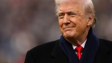 BALTIMORE, MARYLAND - DECEMBER 13: U.S. President Donald Trump smiles from the field before the 126th America's Game between the Army Black Knights and the Navy Midshipmen at M&T Bank Stadium on December 13, 2025 in Baltimore, Maryland. The teams are competing for the Commander-in-Chief's Trophy, with President Trump attending the rivalry for the second consecutive year. Patrick Smith/Getty Images/AFP (Photo by Patrick Smith / GETTY IMAGES NORTH AMERICA / Getty Images via AFP)