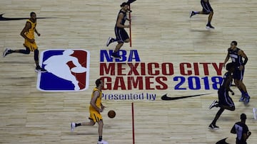 Orlando Magic players (blue) vie for the ball with Utah Jazz players during an NBA Global Games match at the Mexico City Arena, on December 14, 2018, in Mexico City. (Photo by PEDRO PARDO / AFP)