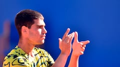 Spain's Carlos Alcaraz celebrates his victory over Greece's Stefanos Tsitsipas during the ATP Barcelona Open "Conde de Godo" tennis tournament singles final match at the Real Club de Tenis in Barcelona on April 23, 2023. (Photo by Pau BARRENA / AFP)