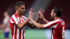 Vitolo celebra su gol con Koke. 