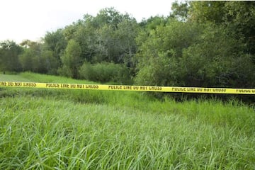 Police tape restricts access to Myakkahatchee Creek Environmental Park on October 20, 2021, in North Port, Florida, following skeletal remains found.