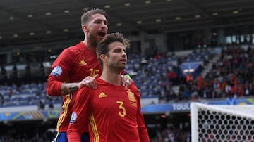 Ramos and Piqué celebrate the Barcelona defender's goal against the Czech Republic