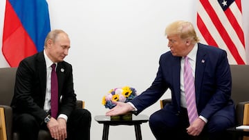 FILE PHOTO: U.S. President Donald Trump gestures during a bilateral meeting with Russia's President Vladimir Putin at the G20 leaders summit in Osaka, Japan, June 28, 2019. REUTERS/Kevin Lamarque//File Photo