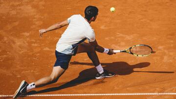 HAMBURG, GERMANY - JULY 24: (EDITOR'S NOTE: Image has been digitally enhanced) Carlos Alcaraz of Spain in action during day nine of the Hamburg European Open 2022 at Rothenbaum on July 24, 2022 in Hamburg, Germany. (Photo by Alexander Scheuber/Getty Images)