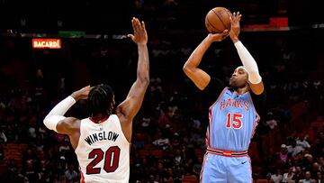 Mar 4, 2019; Miami, FL, USA; Atlanta Hawks forward Vince Carter (15) shoots over Miami Heat forward Justise Winslow (20) during the first half at American Airlines Arena. Mandatory Credit: Jasen Vinlove-USA TODAY Sports