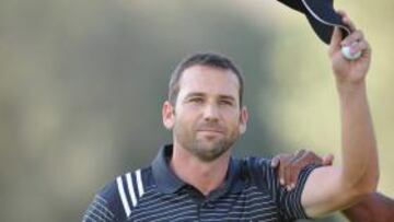 <b>TRIUNFO. </b>Sergio García ganó. Arriba, besa a Nicole, su novia.