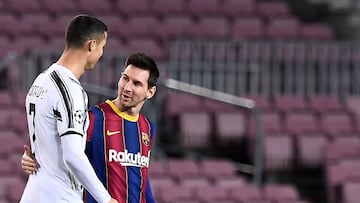 Juventus&#039; Portuguese forward Cristiano Ronaldo greets Barcelona&#039;s Argentinian forward Lionel Messi (R) before the UEFA Champions League group G football match between Barcelona and Juventus at the Camp Nou stadium in Barcelona on December 8, 202