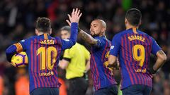 Barcelona&#039;s Argentinian forward Lionel Messi (L) celebrates with Barcelona&#039;s Chilean midfielder Arturo Vidal and Barcelona&#039;s Uruguayan forward Luis Suarez after scoring a penalty kick during the Spanish league football match FC Barcelona against Valencia CF at the Camp Nou stadium in Barcelona on February 2, 2019. (Photo by LLUIS GENE / AFP)