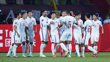 Soccer Football - World Cup - Asia Qualifiers - Second Round - Group A - Guam v China - Suzhou Olympic Sports Center, Suzhou, Jiangsu province, China - May 30, 2021 China&#039;s Lei Wu celebrates scoring their first goal with teammates REUTERS/Aly Song