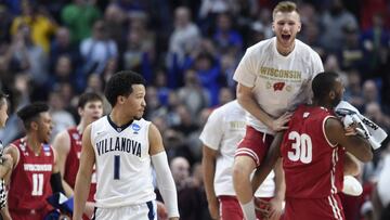 Mar 18, 2017; Buffalo, NY, USA; Villanova Wildcats guard Jalen Brunson (1) walks off the court as the Wisconsin Badgers celebrate their victory during the second round of the 2017 NCAA Tournament at KeyBank Center. Wisconsin won 65-62. Mandatory Credit: Mark Konezny-USA TODAY Sports