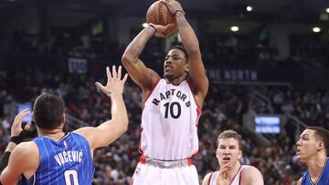 Mar 27, 2017; Toronto, Ontario, CAN; Toronto Raptors guard DeMar DeRozan (10) shoots a basket against the Orlando Magic at Air Canada Centre. The Raptors beat the Magic 131-112. Mandatory Credit: Tom Szczerbowski-USA TODAY Sports
