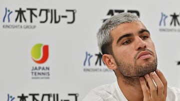 Spain's Carlos Alcaraz attends a press conference on the sidelines of the men's ATP Japan Open tennis tournament in Tokyo on September 24, 2025. (Photo by Richard A. Brooks / AFP)