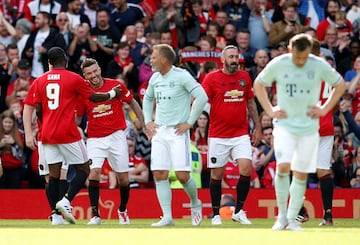 Soccer Football - 1999 Treble Reunion Match - Manchester United '99 Legends v Bayern Munich Legends - Old Trafford, Manchester, Britain - May 26, 2019  Manchester United's David Beckham celebrates scoring their fifth goal with Louis Saha            Action