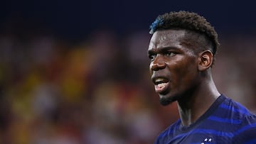 (FILES) France's midfielder Paul Pogba reacts during the UEFA EURO 2020 round of 16 football match between France and Switzerland at the National Arena in Bucharest on June 28, 2021. France star Paul Pogba has been given a four-year ban from football by Italy's anti-doping tribunal after testing positive for testosterone last August, his club Juventus said on February 29, 2024. (Photo by FRANCK FIFE / POOL / AFP)