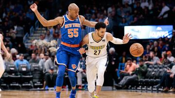 Jan 25, 2018; Denver, CO, USA; New York Knicks guard Jarrett Jack (55) and Denver Nuggets guard Jamal Murray (27) battle for a loose ball in the third quarter at the Pepsi Center. Mandatory Credit: Isaiah J. Downing-USA TODAY Sports