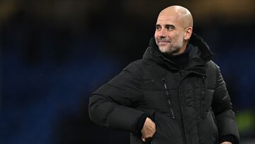 Manchester City's Spanish manager Pep Guardiola reacts at the end of the English Premier League football match between Everton and Manchester City at Goodison Park in Liverpool, north west England on December 27, 2023. Manchester City wins against Everton 3 - 1. (Photo by Paul ELLIS / AFP) / RESTRICTED TO EDITORIAL USE. No use with unauthorized audio, video, data, fixture lists, club/league logos or 'live' services. Online in-match use limited to 120 images. An additional 40 images may be used in extra time. No video emulation. Social media in-match use limited to 120 images. An additional 40 images may be used in extra time. No use in betting publications, games or single club/league/player publications. /