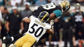 JACKSONVILLE, FL - AUGUST 14: Marcedes Lewis #89 of the Jacksonville Jaguars is brought down by Ryan Shazier #50 of the Pittsburgh Steelers during a preseason game at EverBank Field on August 14, 2015 in Jacksonville, Florida.   Stacy Revere/Getty Images/AFP
 == FOR NEWSPAPERS, INTERNET, TELCOS &amp; TELEVISION USE ONLY ==