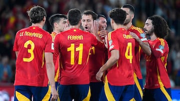 Spain players celebrate their second goal scored by Spain's forward #21 Mikel Oyarzabal during the 2026 World Cup qualifier Europe zone group E football match between Spain and Georgia at Manuel Martinez Valero stadium in Elche on October 11, 2025. (Photo by Jose Jordan / AFP)