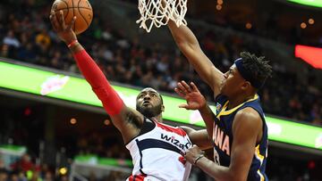 Dec 28, 2016; Washington, DC, USA; Washington Wizards guard John Wall (2) shoots as Indiana Pacers center Myles Turner (33) defends during the second half at Verizon Center. The Wizards won 111 - 105. Mandatory Credit: Brad Mills-USA TODAY Sports