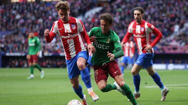 Griezmann y Milla en el Atlético-Granada
