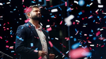 Chile&#039;s President-elect Gabriel Boric celebrates with supporters after winning the presidential election in Santiago, Chile.