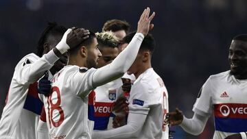 Lyon's French midfielder Nabil Fekir (L) celebrates after scoring a goal during the UEFA Europa League football match between Olympique Lyonnais (OL) and Villarreal CF (VCF) on February 15, 2018, at the Groupama Stadium in Decines-Charpieu, central-e