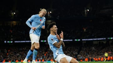 Soccer Football - Premier League - Manchester City v AFC Bournemouth - Etihad Stadium, Manchester, Britain - November 2, 2025 Manchester City's Nico O'Reilly celebrates scoring their third goal with Manchester City's Erling Haaland Action Images via Reuters/Jason Cairnduff EDITORIAL USE ONLY. NO USE WITH UNAUTHORIZED AUDIO, VIDEO, DATA, FIXTURE LISTS, CLUB/LEAGUE LOGOS OR 'LIVE' SERVICES. ONLINE IN-MATCH USE LIMITED TO 120 IMAGES, NO VIDEO EMULATION. NO USE IN BETTING, GAMES OR SINGLE CLUB/LEAGUE/PLAYER PUBLICATIONS. PLEASE CONTACT YOUR ACCOUNT REPRESENTATIVE FOR FURTHER DETAILS..