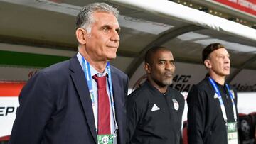 Iran&#039;s coach Carlos Queiroz (1st-L) attends the anthems prior to the start of the 2019 AFC Asian Cup Group D football match between Yemen and Iran at the Mohammed Bin Zayed stadium in Abu Dhabi on January 07, 2019. (Photo by KHALED DESOUKI / AFP)