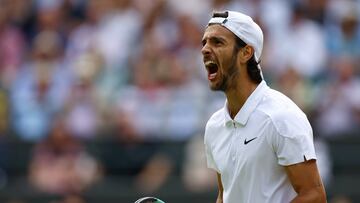 Tennis - Wimbledon - All England Lawn Tennis and Croquet Club, London, Britain - July 10, 2024 Italy's Lorenzo Musetti reacts during his quarter final match against Taylor Fritz of the U.S. REUTERS/Hannah Mckay