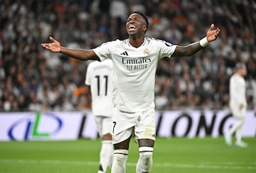 Real Madrid's Brazilian forward #07 Vinicius Junior reacts during the Spanish league football match between Real Madrid CF and Deportivo Alaves at the Santiago Bernabeu stadium in Madrid on September 24, 2024. (Photo by JAVIER SORIANO / AFP)