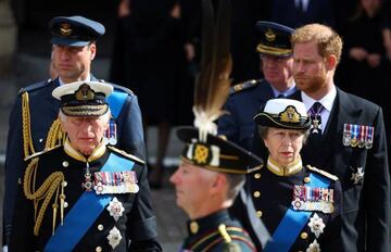 King Charles III (left), Princess Anne, Princess Royal, Prince William (back left), Prince of Wales, and Prince Britain's Prince Harry (back right), Duke of Sussex, stand outside Westminster Abbey after the State Funeral Service.