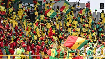 Senegal's supporters wave during the Africa Cup of Nations (CAN) 2024 group C football match between Senegal and Gambia at Stade Charles Konan Banny in Yamoussoukro on January 15, 2024. (Photo by Issouf SANOGO / AFP)