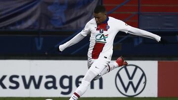Paris Saint-Germain's French forward Kylian Mbappe shoots on goal during the French Cup round-of-64 football match between Stade Malherbe Caen and Paris Saint-Germain at the Michel-d'Ornano Stadium in Caen, northwestern France on February 10, 20