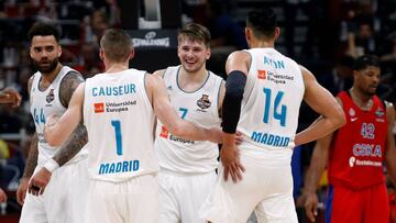 Basketball - EuroLeague Final Four Semi Final A - CSKA Moscow vs Real Madrid - ?Stark Arena?, Belgrade, Serbia - May 18, 2018 Real Madrid's Luka Doncic with Gustavo Ayon and Fabien Causeur REUTERS/Alkis Konstantinidis