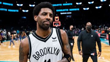 CHARLOTTE, NORTH CAROLINA - MARCH 08: Kyrie Irving #11 of the Brooklyn Nets walks off the court after scoring 50 points and defeating the Charlotte Hornets during their game at Spectrum Center on March 08, 2022 in Charlotte, North Carolina. NOTE TO USER: User expressly acknowledges and agrees that, by downloading and or using this photograph, User is consenting to the terms and conditions of the Getty Images License Agreement.   Jacob Kupferman/Getty Images/AFP
 == FOR NEWSPAPERS, INTERNET, TELCOS &amp; TELEVISION USE ONLY ==