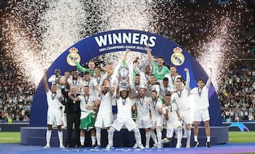 Real Madrid lift the trophy after the UEFA Champions League final match between Liverpool FC and Real Madrid at Stade de France 