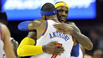Oct 30, 2014; Cleveland, OH, USA; Cleveland Cavaliers forward LeBron James (back) hugs New York Knicks forward Carmelo Anthony (7) after the Knicks&#039; 95-90 win over the Cavaliers at Quicken Loans Arena. Mandatory Credit: David Richard-USA TODAY Sports