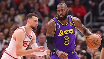 CHICAGO, ILLINOIS - MARCH 29: LeBron James #6 of the Los Angeles Lakers is defended by Zach LaVine #8 of the Chicago Bulls during the first half at United Center on March 29, 2023 in Chicago, Illinois. NOTE TO USER: User expressly acknowledges and agrees that, by downloading and or using this photograph, User is consenting to the terms and conditions of the Getty Images License Agreement.   Michael Reaves/Getty Images/AFP (Photo by Michael Reaves / GETTY IMAGES NORTH AMERICA / Getty Images via AFP)