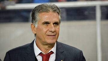 FILE PHOTO: Iran&#039;s national soccer team coach Carlos Queiroz looks on before the international soccer friendly match between Iran and Sweden at Friends Arena in Stockholm March 31, 2015. REUTERS/Henrik Montgomery/TT News Agency/File Photo ATTENTION EDITORS - THIS IMAGE WAS PROVIDED BY A THIRD PARTY. THIS PICTURE IS DISTRIBUTED EXACTLY AS RECEIVED BY REUTERS, AS A SERVICE TO CLIENTS. FOR EDITORIAL USE ONLY. NOT FOR SALE FOR MARKETING OR ADVERTISING CAMPAIGNS. SWEDEN OUT. NO COMMERCIAL OR EDITORIAL SALES IN SWEDEN. NO COMMERCIAL SALES.