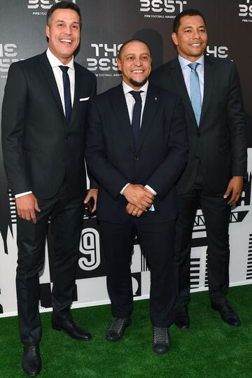 Los exfutbolistas braileños Julio Cesar, Roberto Carlos y  Gilberto Silva.