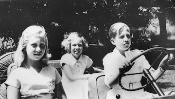 King Consort Constantine of Greece driving a car with his sisters, Princesses Irene and Sophia, when they were all children, circa 1955. Printed following the announcement of his marriage to Princess Anne Marie on August 21st 1964. (Photo by Central Press/Hulton Archive/Getty Images)