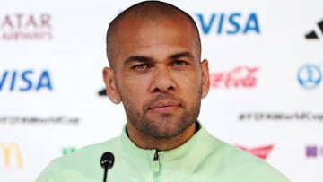 DOHA, QATAR - DECEMBER 01: Dani Alves of Brazil speaks during the Brazil Press Conference at the Main Media Center on December 01, 2022 in Doha, Qatar. (Photo by Mohamed Farag/Getty Images)