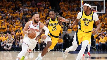 Jalen Brunson #11 of the New York Knicks drives to the basket against Aaron Nesmith #23 and Myles Turner #33 of the Indiana Pacers during the first quarter in Game Six of the Eastern Conference Second Round Playoffs at Gainbridge Fieldhouse on May 17, 2024 in Indianapolis, Indiana.