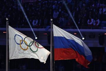 Russian national flag next to the Olympic flag at 2014 Winter Olympics in Sochi, Russia.