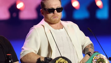 (FILES) Mexico's boxer Canelo Alvarez gives a press conference in Riyadh on June 20, 2025 ahead of his super-middleweight title fight against Terence Crawford. Legendary Mexican boxer Saul "Canelo" Alvarez relinquished his reign in mid-September 2025 after a unanimous decision defeat to American Terence Crawford, who took his four undisputed super middleweight championship belts. (Photo by Fayez NURELDINE / AFP)