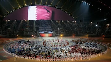 A general view of the Khalifa Stadium with the Qatari flag being displayed on a screen during the closing ceremony of the 15th Asian Games in Doha, December 15, 2006. 