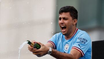 Soccer Football - Manchester City celebrate winning the Premier League - Manchester, Britain - May 23, 2022 Manchester City's Rodri celebrate during the victory parade Action Images via Reuters/Jason Cairnduff