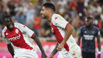 Monaco's French midfielder Youssouf Fofana (L) and Monaco's Chilean defender Guillermo Maripan (C) during the French L1 football match between AS Monaco and Olympique Lyonnais at the Louis II Stadium (Stade Louis II) in the Principality of Monaco on September 11, 2022. (Photo by CHRISTOPHE SIMON / AFP)