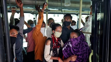 Commuters wearing protective masks travel in a passenger bus, amidst the coronavirus disease (COVID-19) outbreak, in Ahmedabad, India, September 11, 2020. REUTERS/Amit Dave